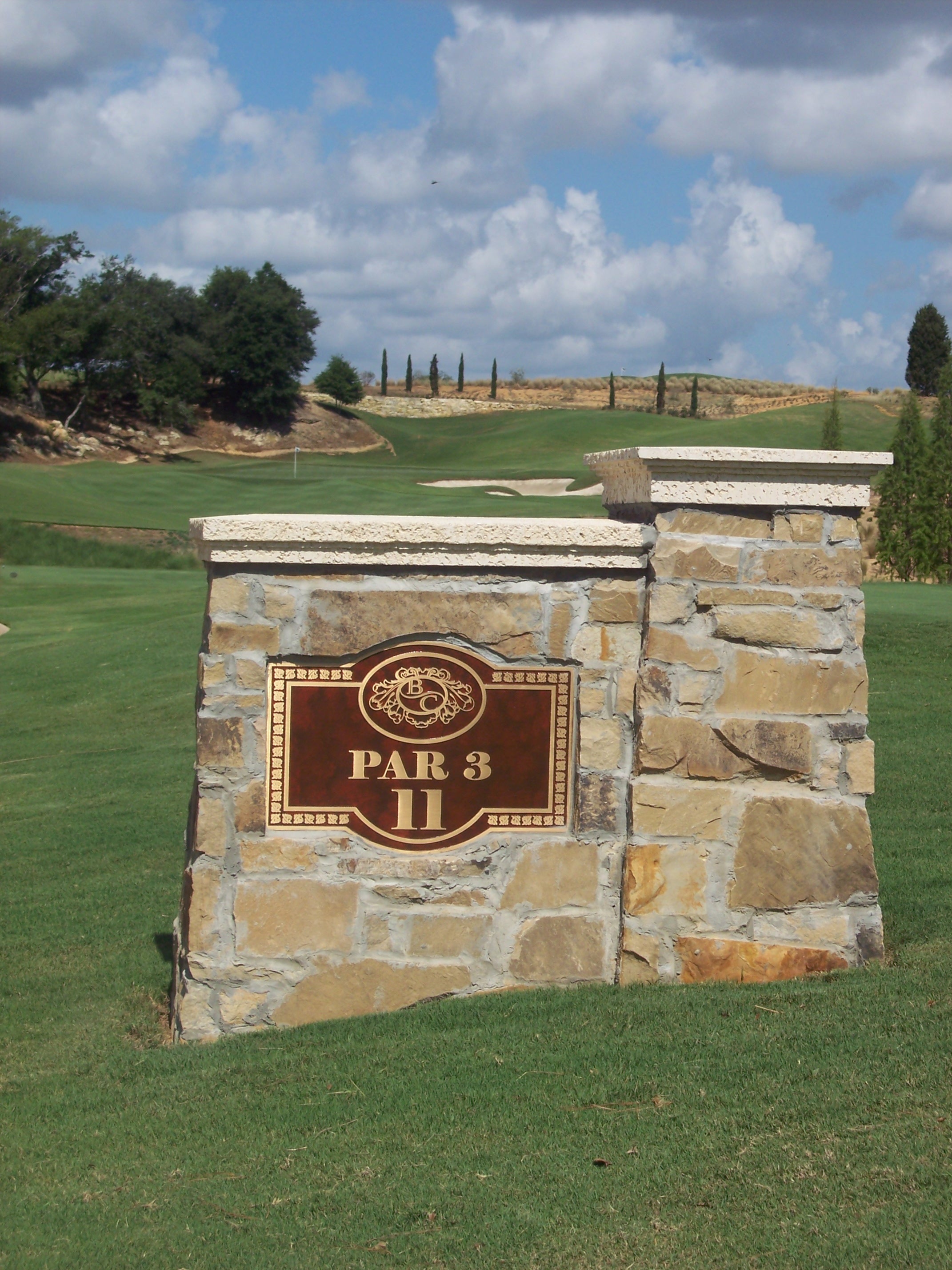 cast bronze golf sign
